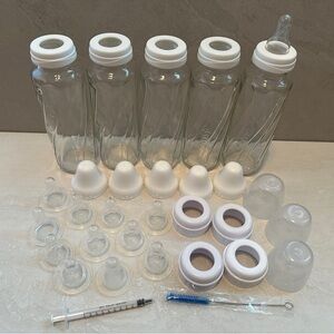 Set Of 5 Evenflow Classic Glass Baby Bottles With New Nipples And Misc Pieces
